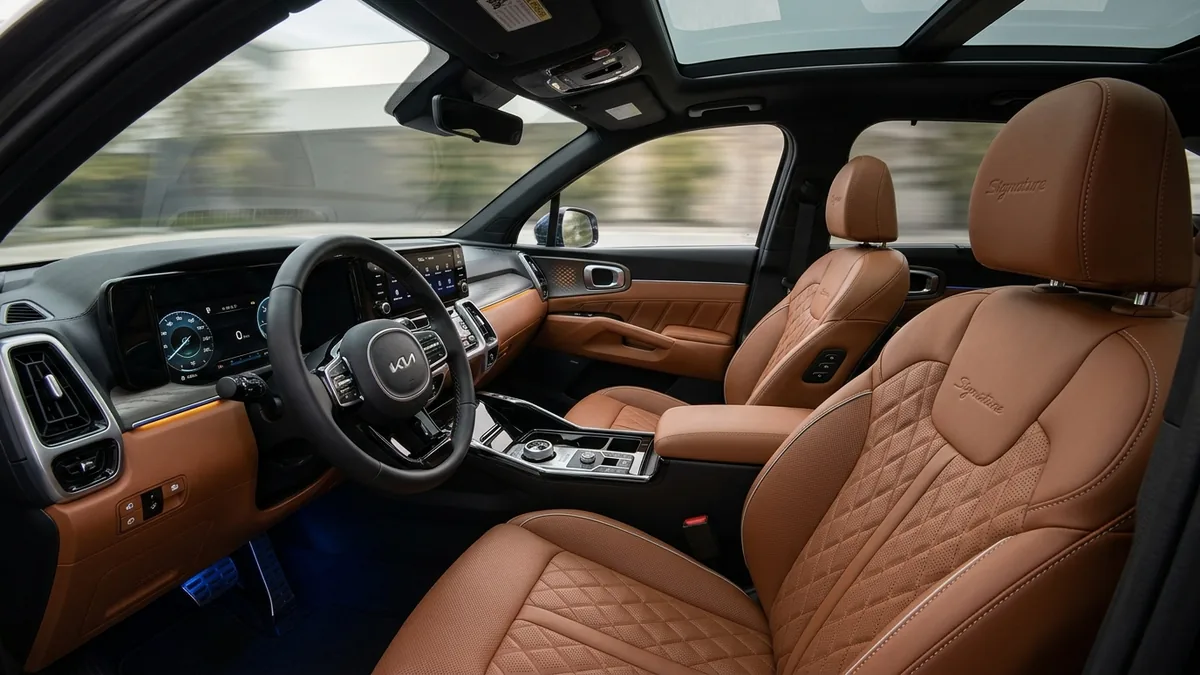 Độ nội thất da Nappa bò Ý chần múi quả trám Signature xe Kia Sorento và Sportage tại MORCAR