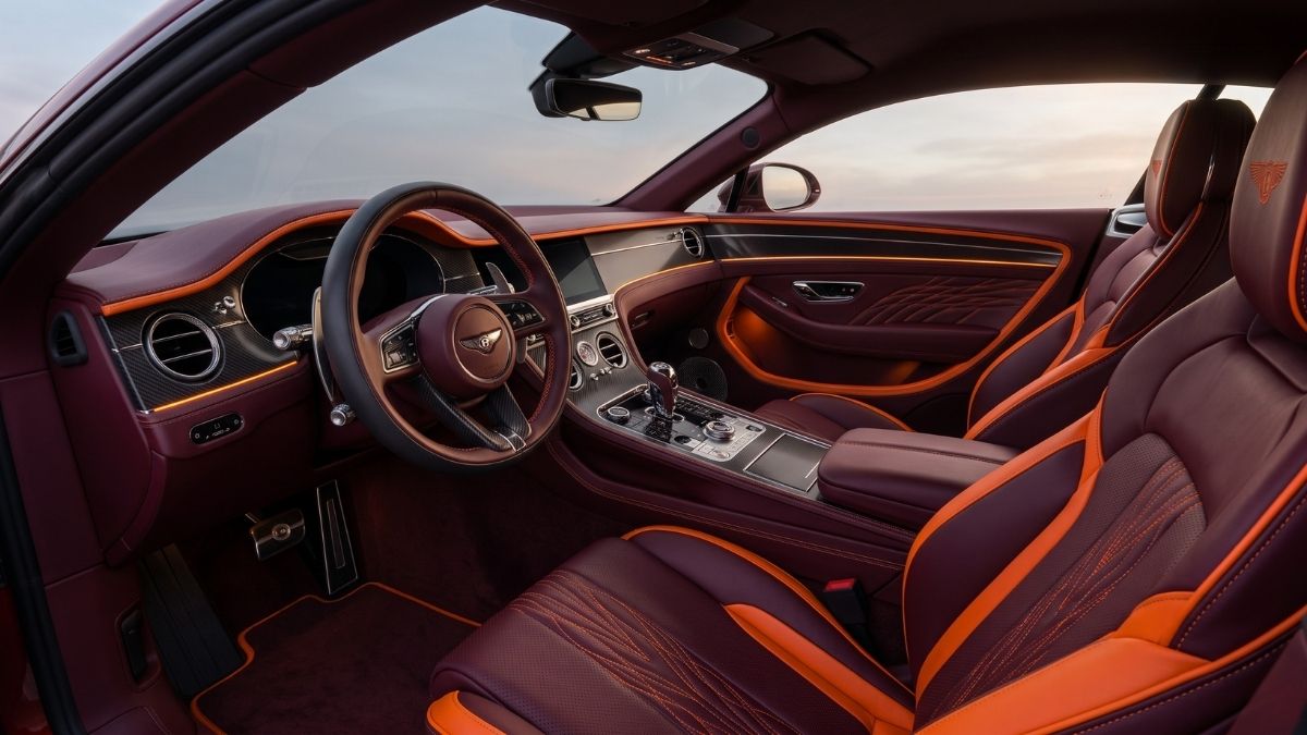 Đổi màu nội thất ô tô phong thủy mệnh Hỏa tông màu đỏ bordeaux phối cam hermes tại MORCAR